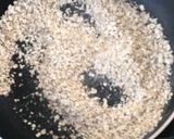 A picture of step 1 of Oats almonds sukhdi.