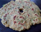 A picture of step 4 of Multigrain-Onion Thalipeeth.