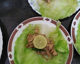 A picture of step 9 of Nutty lemony cabbage roll in green sauce.