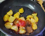 A picture of step 2 of Achari Aloo.