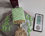 A picture of step 18 of Quaid e Azam police Medal QPM coffee cake.