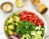A picture of step 1 of Avocado Tomato Cucumber Salad.
