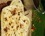 A picture of step 9 of Peshawari charsi karahi with tawa naan..