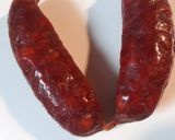 A picture of step 1 of Chorizo and Eggs in a Cheesey Tomato Sauce.