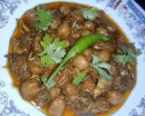 A picture of step 6 of Qorma Murgh Cholay.