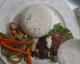 A picture of step 9 of Teragon steaks with garlic rice and vegs.