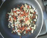 Foto del paso 3 de la receta: Pata y muslo morrón relleno y arroz amarillo