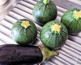 Une image de l'étape 1 de Petites Courgettes rondes farcies à l'aubergine au Cook Expert.