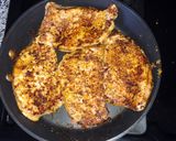A picture of step 2 of Smothered Pork Chops.