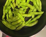 A picture of step 2 of Grilled Edamame with Horinishi Spice.