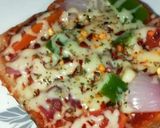 A picture of step 6 of Bread pizza.