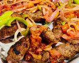 A picture of step 6 of Baked Seekh kabab with tomatoes.
