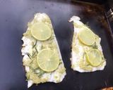 Une image de l'étape 8 de Filets de lieu noir au citron vert, ail et romarin.
