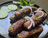 A picture of step 13 of Mutton Kebab with leftover meat and rice.