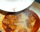 A picture of step 12 of Chicken Rogan Josh.