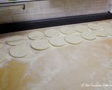 A picture of step 2 of Mini Calzones with Sausage and Cheese Filling.