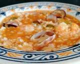 Foto del paso 11 de la receta: Arroz caldoso con langostinos y almejas