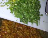 A picture of step 8 of (Brinjal)Baigan ka Bharta in Green Onions.