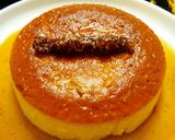 A picture of step 8 of Christmas special eggless caramel custard pudding cake with dry fruit chikki log.