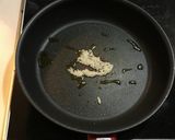 A picture of step 2 of Easy Spicy Garlic Edamame.