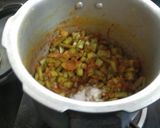 A picture of step 1 of Cluster Beans Cooked in Coconut Milk (Pressure Cooker).