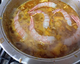 Foto del paso 18 de la receta: Arroz con chipirones, lomo de cerdo y gambones