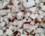 A picture of step 1 of Coconut laddus.