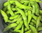 A picture of step 1 of Garlic Butter Sautéed Edamame.
