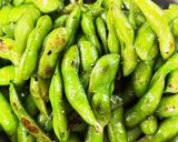 A picture of step 5 of Garlic Butter Sautéed Edamame.