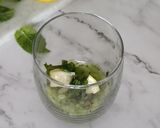 A picture of step 2 of Kiwi mojito.