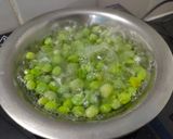 A picture of step 1 of Cauliflower peas and potato sabzi.