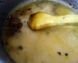 A picture of step 6 of Scrumptious thai shrimps soup with red sauce bread.