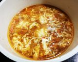 A picture of step 5 of Chili Crab-Style Spicy Egg Soup Ramen.
