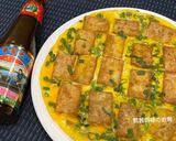 A picture of step 9 of Pan-Fried Tofu and Eggs with Oyster Sauce.