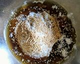 A picture of step 2 of Ghila Til Pitha.