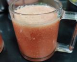 A picture of step 2 of Pomegranate orange juice.