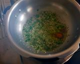 A picture of step 2 of Green Beans and Brinjal Subzi.