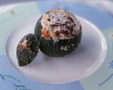 Une image de l'étape 8 de Courgettes rondes farcies à la ricotta et aux champignons.