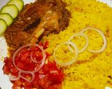 A picture of step 3 of Turmeric rice served with chicken.
