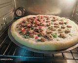 A picture of step 4 of Tikka n kabab pizza.