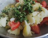 A picture of step 3 of Aloo rassa.