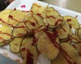 Foto del paso 4 de la receta: Papas fritas sin aceite al microondas aderezadas con ketchup🍟🍠