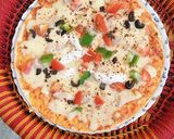 A picture of step 5 of Cheesy pan pizza.
