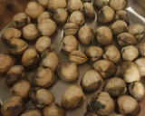 Foto del paso 4 de la receta: Arroz con Berberechos y Sepia