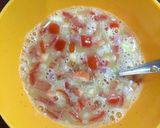 A picture of step 3 of Cheese Tomato Egg Toast.