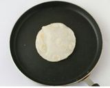 A picture of step 8 of Ari Pathiri/ Rice Rotti.