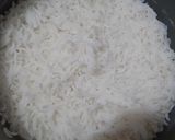 A picture of step 2 of Narali bhat (Coconut rice).
