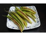 A picture of step 3 of Mirchi bhajiya.