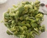 A picture of step 2 of Celery with Avocado and Green Onion.