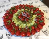 Une image de l'étape 9 de Salade de tomates cerises, concombre,câpres italiennes et basilic en fleur.